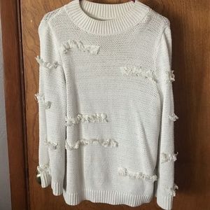 Women's large cream eyelash sweater.